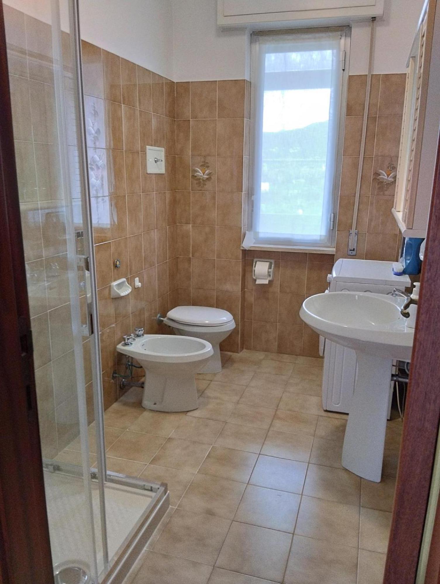 Appartamento Con Posto Auto ลาวาญา ภายนอก รูปภาพ